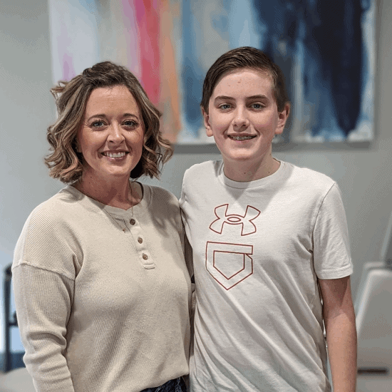 Mother and son posing and smiling